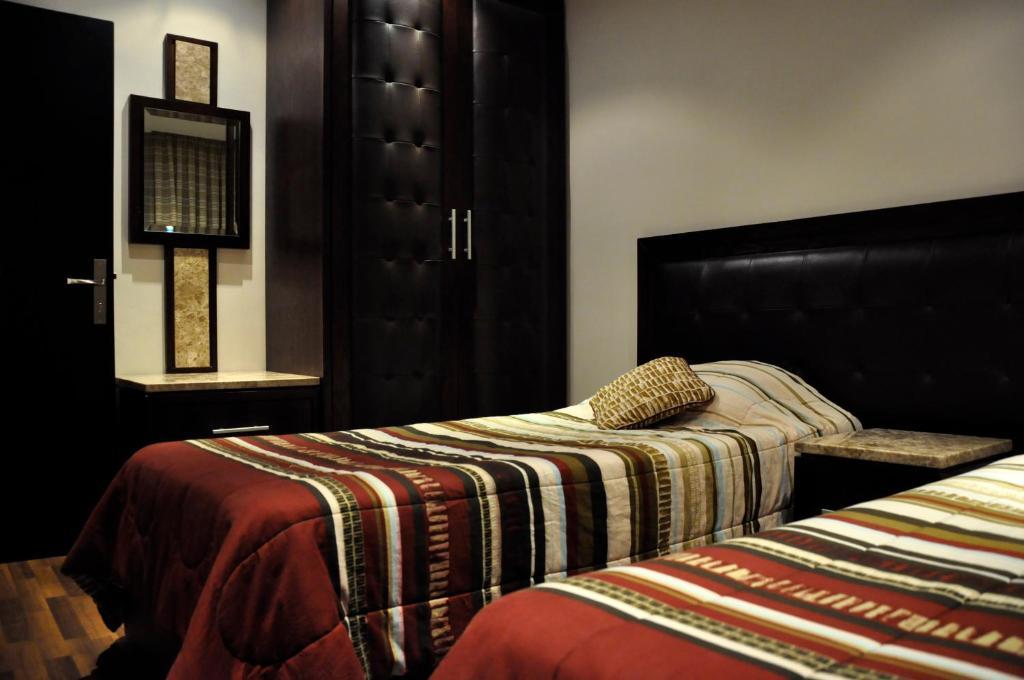 Granada Suites Hotel Amman Chambre photo